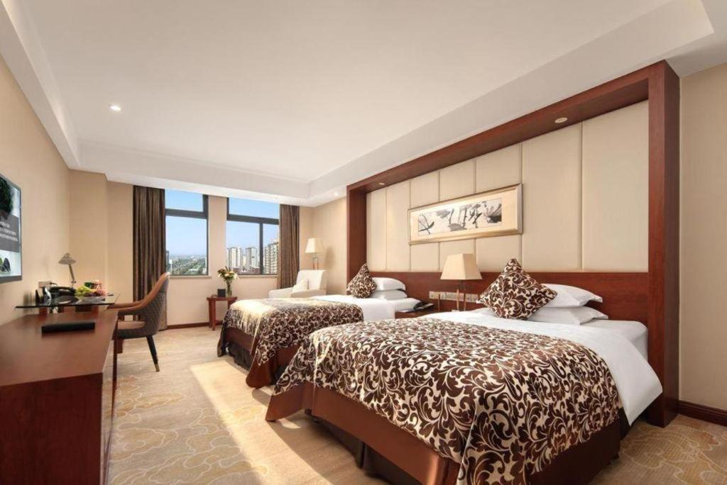 Grand Metropark Hotel Shangqiu Exterior photo